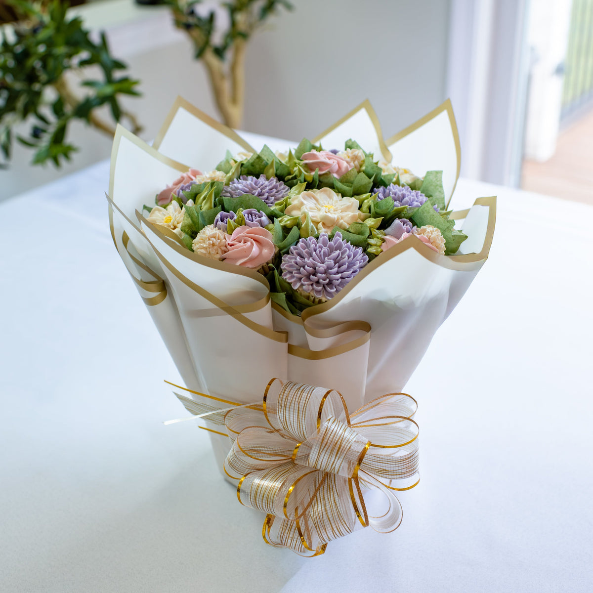 Lavender Love floral cupcake bouquet for Wednesday delivery — bouquet view