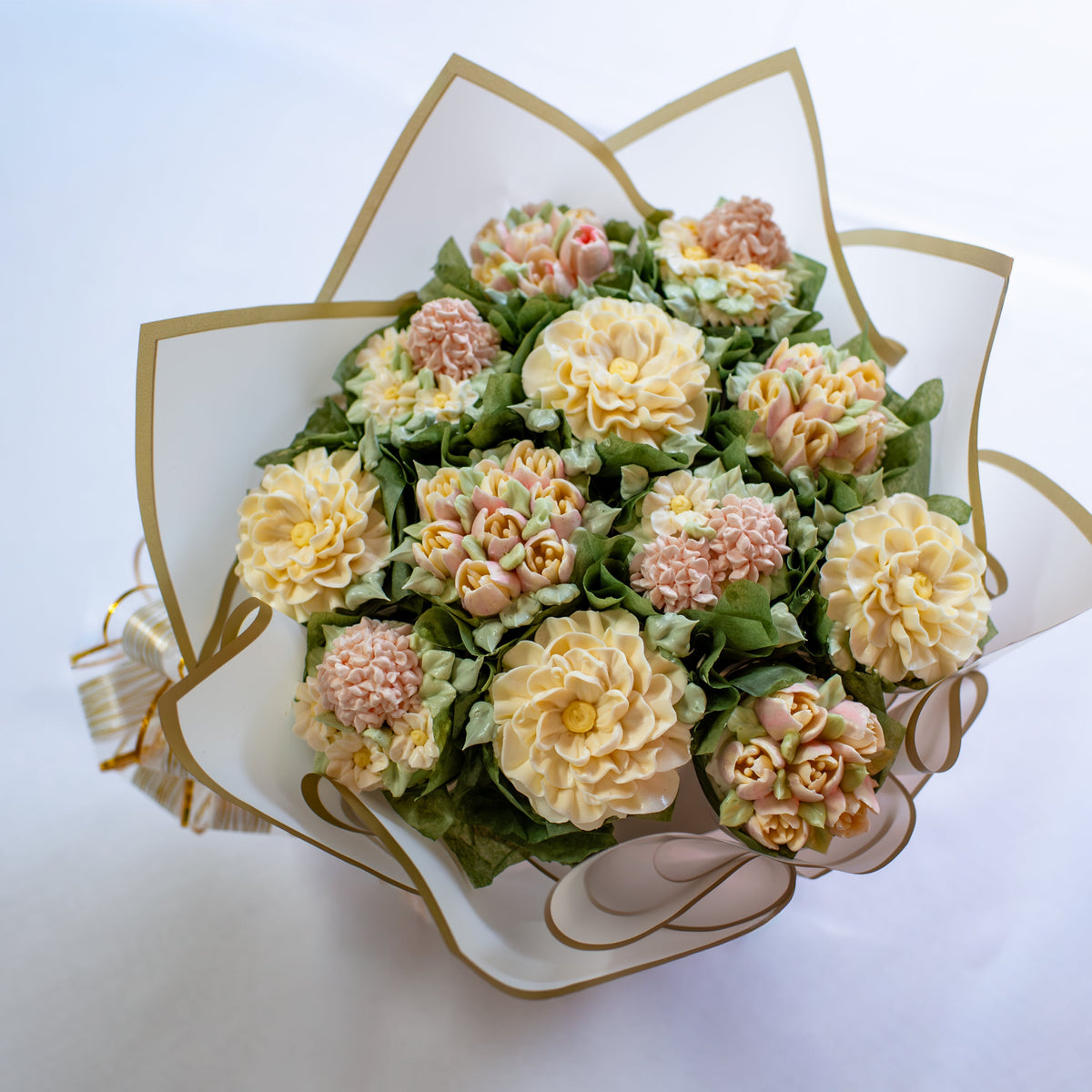 Ivory Garden floral cupcake bouquet for Tuesday delivery — bouquet view