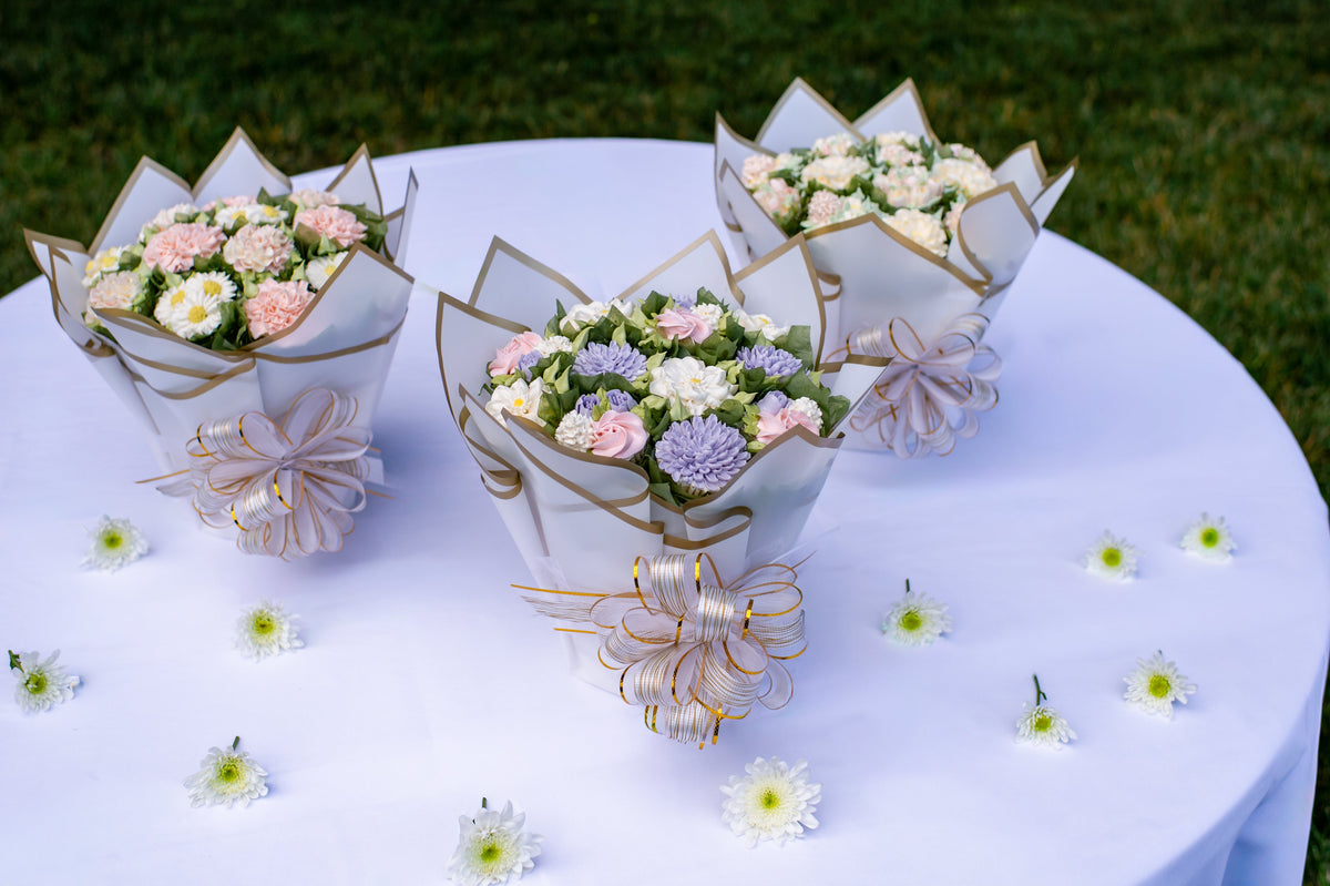 Three Butter Daisy floral cupcake bouquets